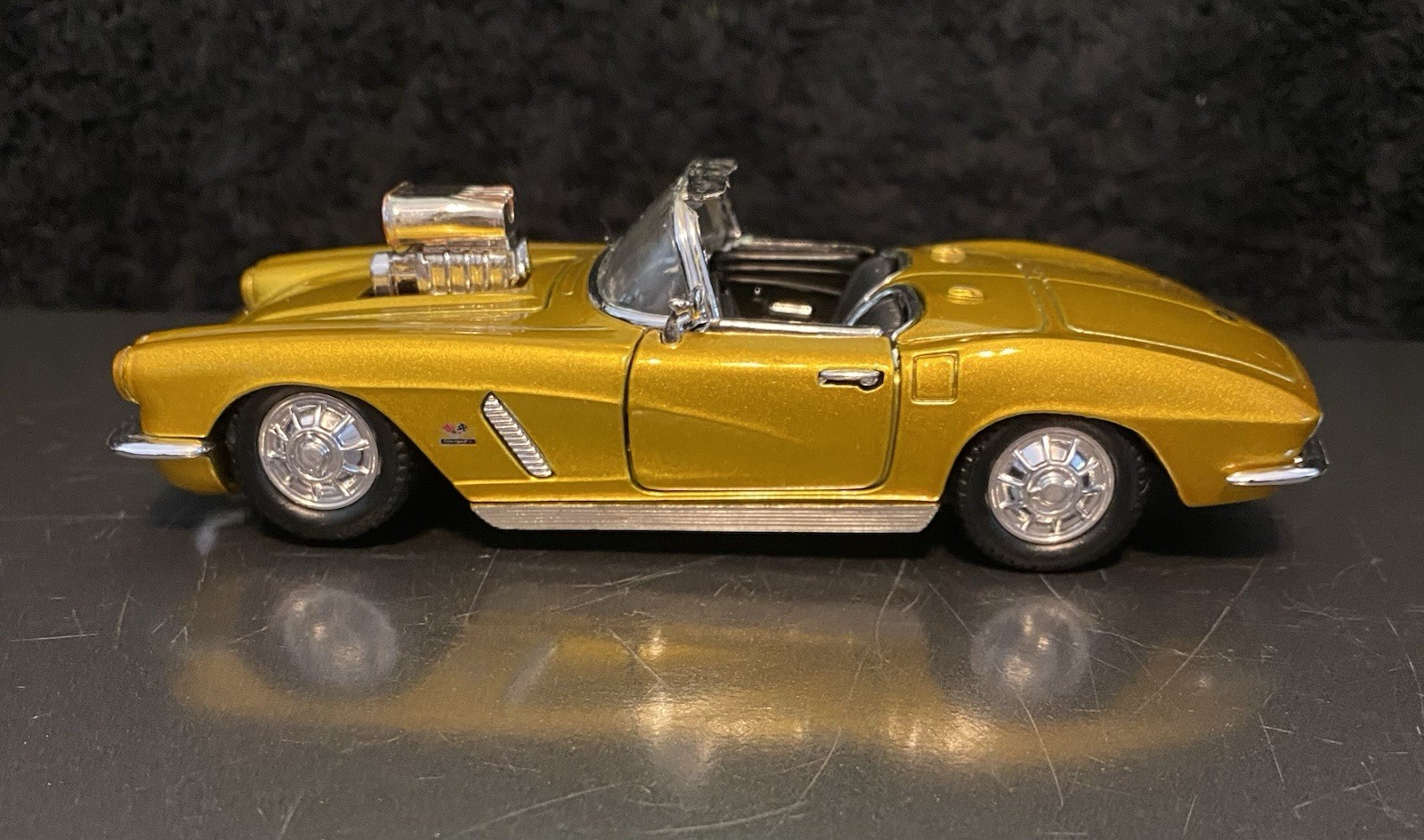 1962 Gold Chevrolet Corvette Convertible 1/32 Scale. SS 5750. Pullback action.