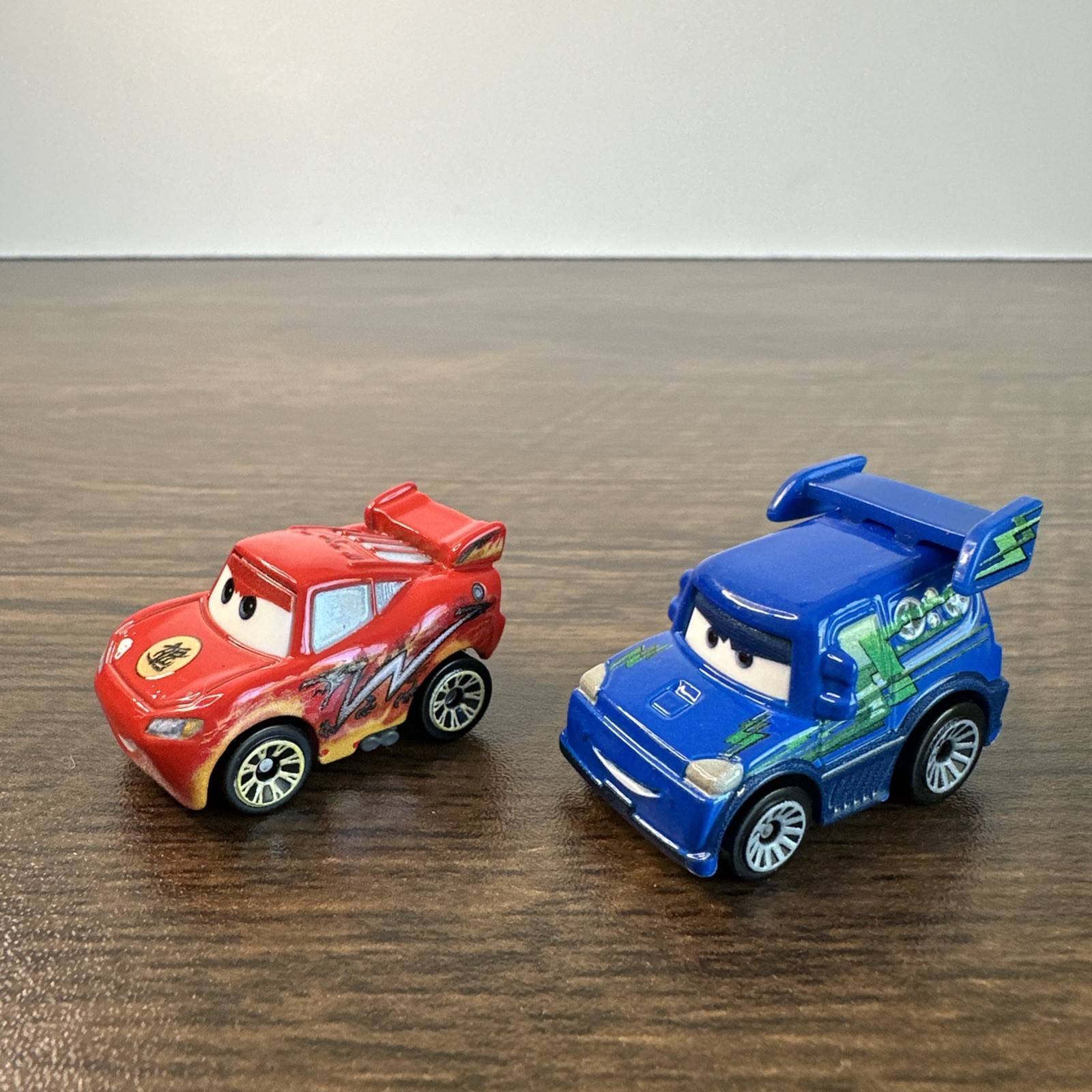 Disney Cars MINI Racers Dragon Lightning McQueen & Race O Rama DJ