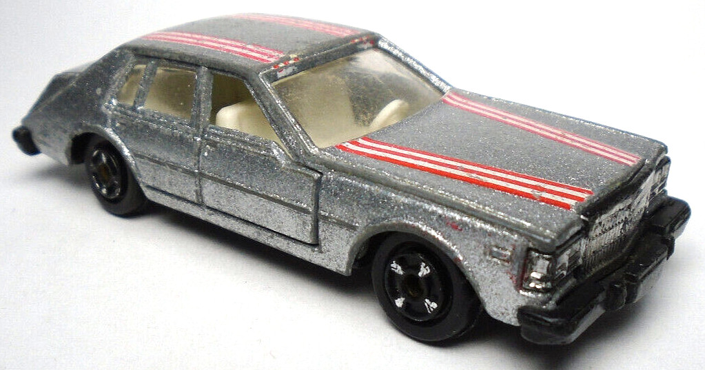 VINTAGE MADE IN HONG KONG CADILLAC SEVILLE SILVER 3″ DIECAST CAR OPENING DOORS