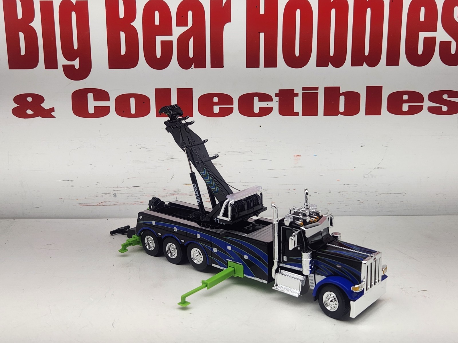 1/64 DCP/FG #60-2248 Black, Blue, & Green 389 DC Peterbilt Century 1150 Rotator
