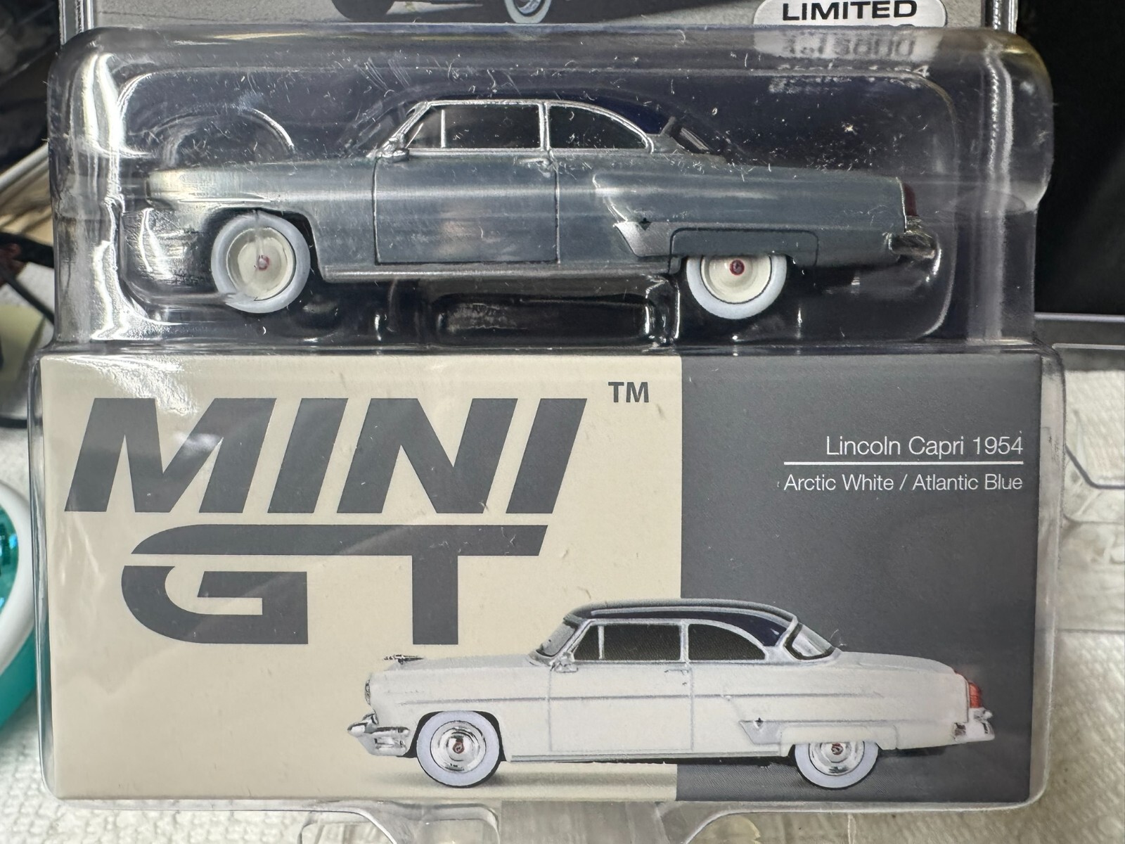 1:64 MiniGT 1954 Lincoln Capri Arctic White / Blue MGT00631-MJC Raw Chase