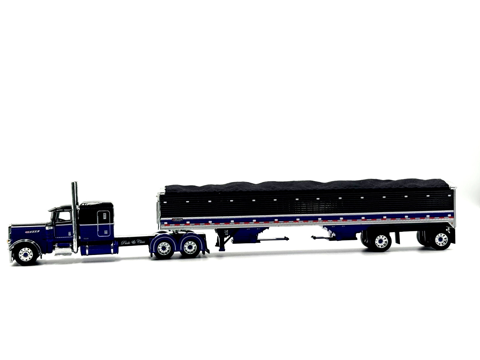 DCP 1/64 Peterbilt 389 Pride N Class Flat Top w/ Wilson Grain Trailer 60-2153