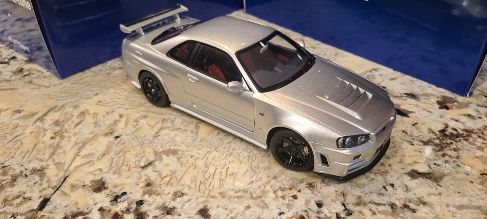 Nissan Skyline GT-R (R34) Z-Tune, Z-Tune Silver in 1:18 scale by AUTOart 77461