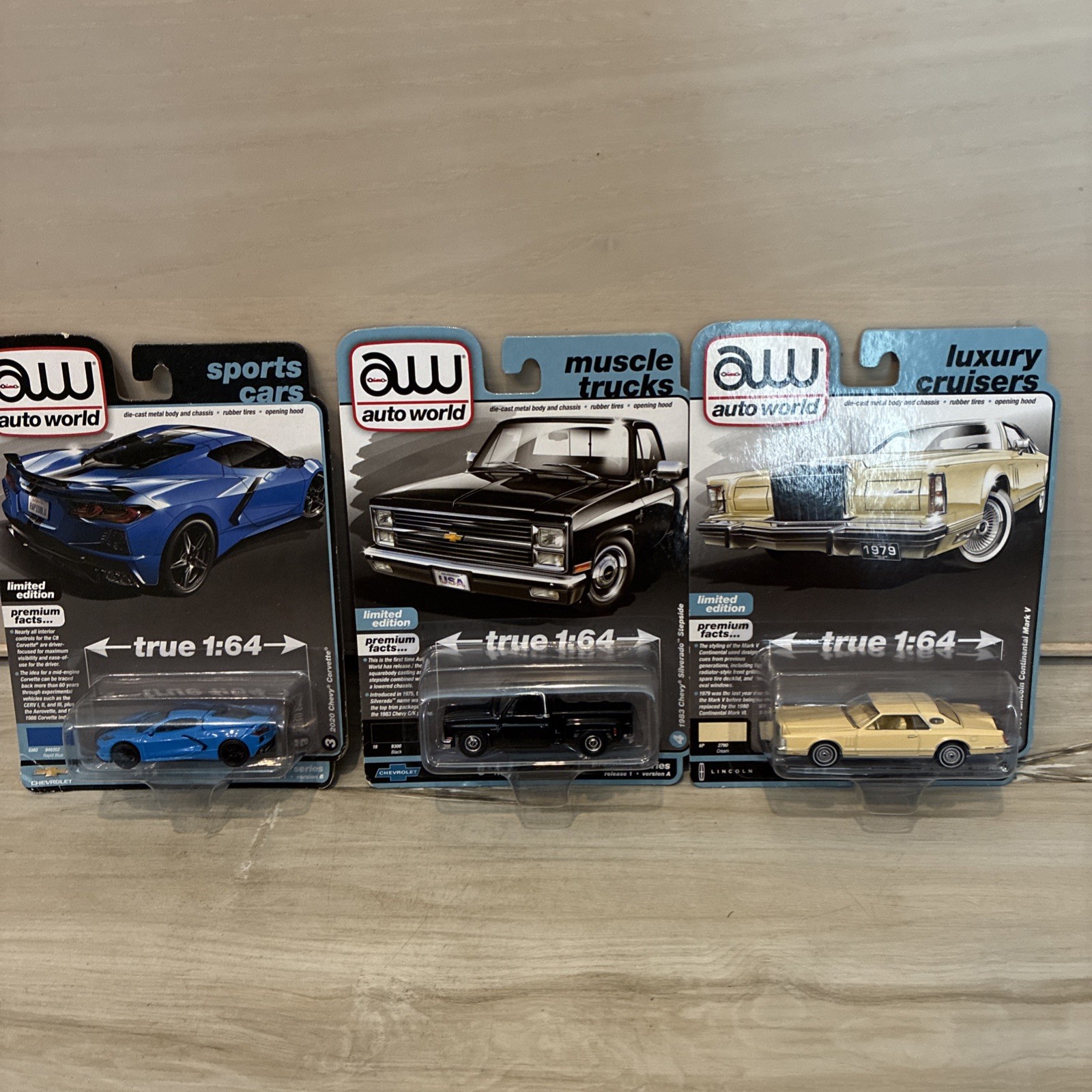 Auto World Luxury Sports Muscle 3 LOT Lincoln Continental, Corvette Silverado