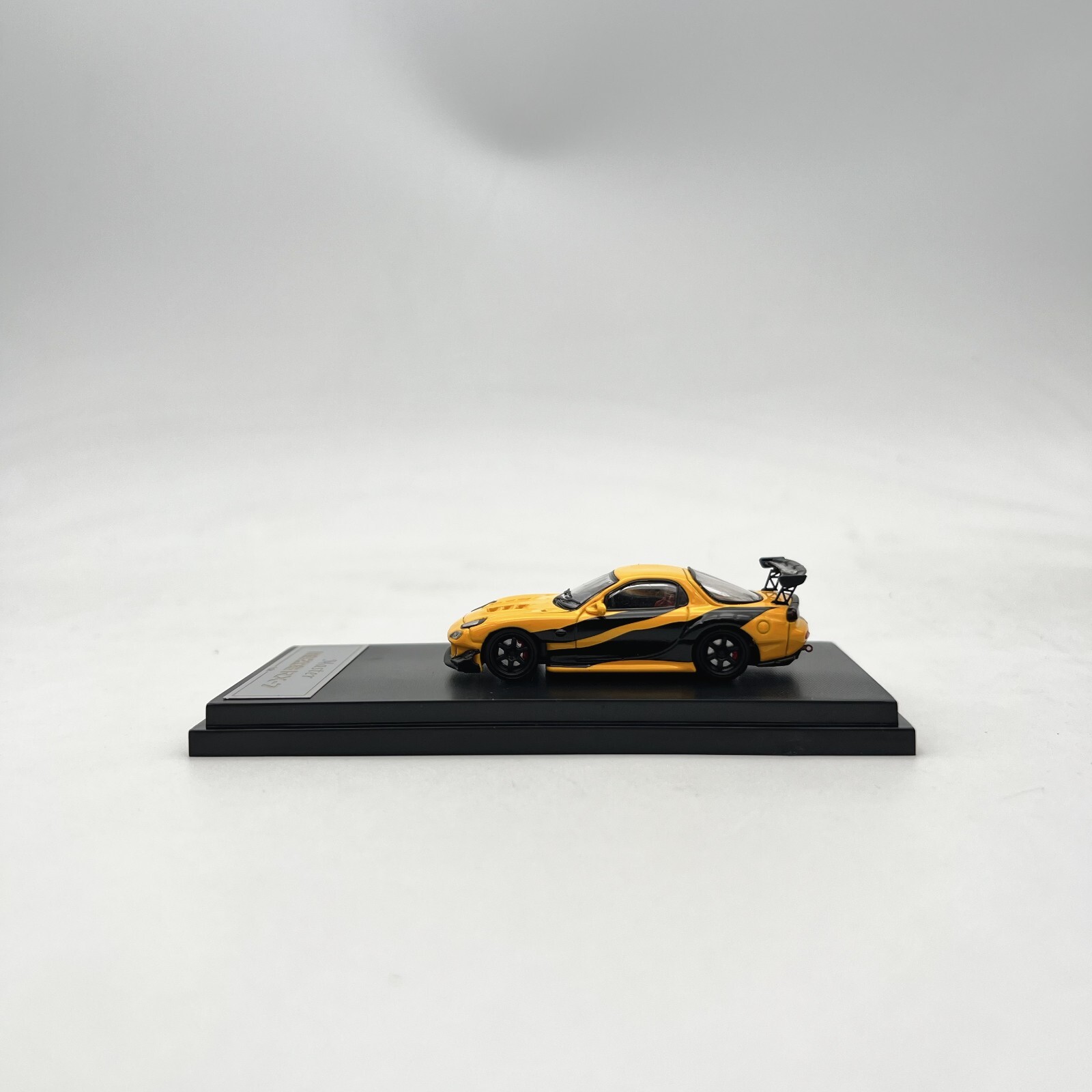 Master 1:64 Mazda RX-7 (Yellow/Black) Diecast Model Car