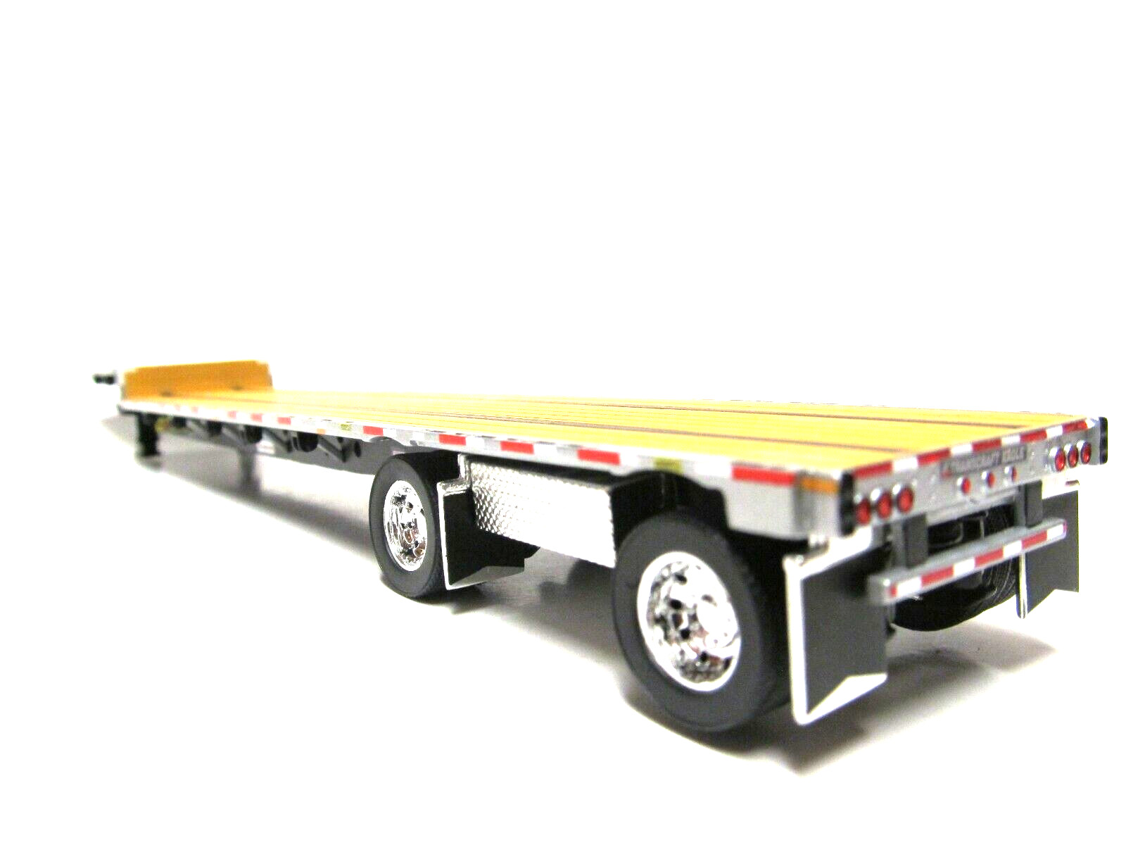 DCP 1/64 SCALE TRANSCRAFT STEP DECK TRAILER TAN / BROWN DECK WITH BLACK FRAME