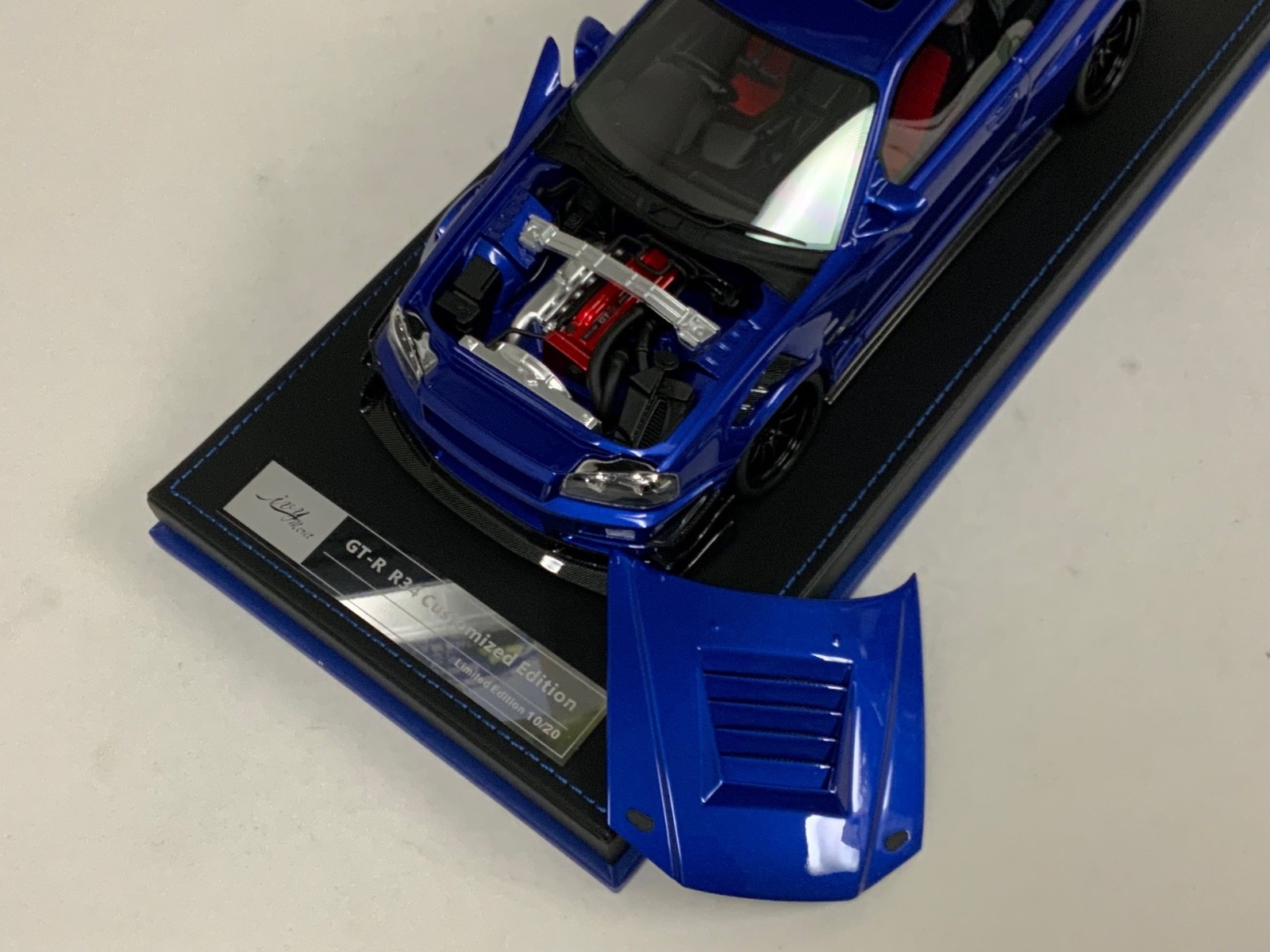 1/18 IVY Nissan R34 customized with Full Engine Blue leather base 20 pieces
