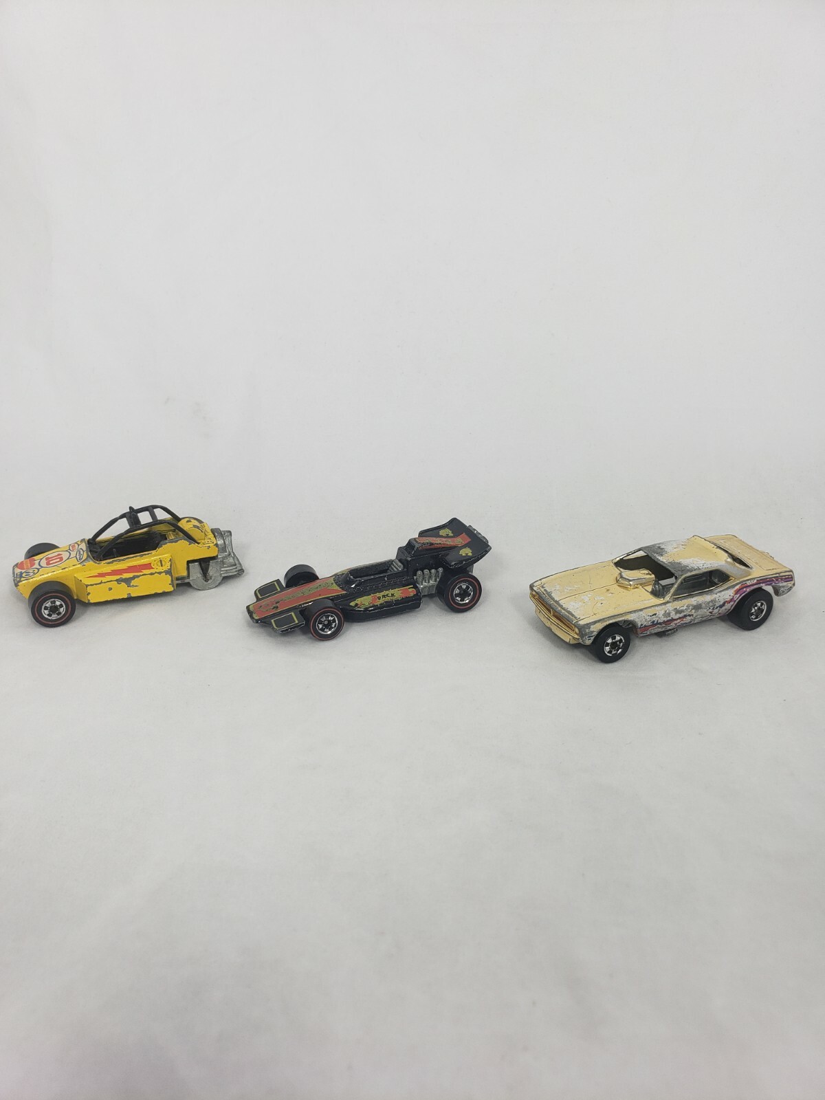 Lot of 3 Vintage Hotwheels. 1969 – 1975 Hemi Hauler, Redline, Rock Buster