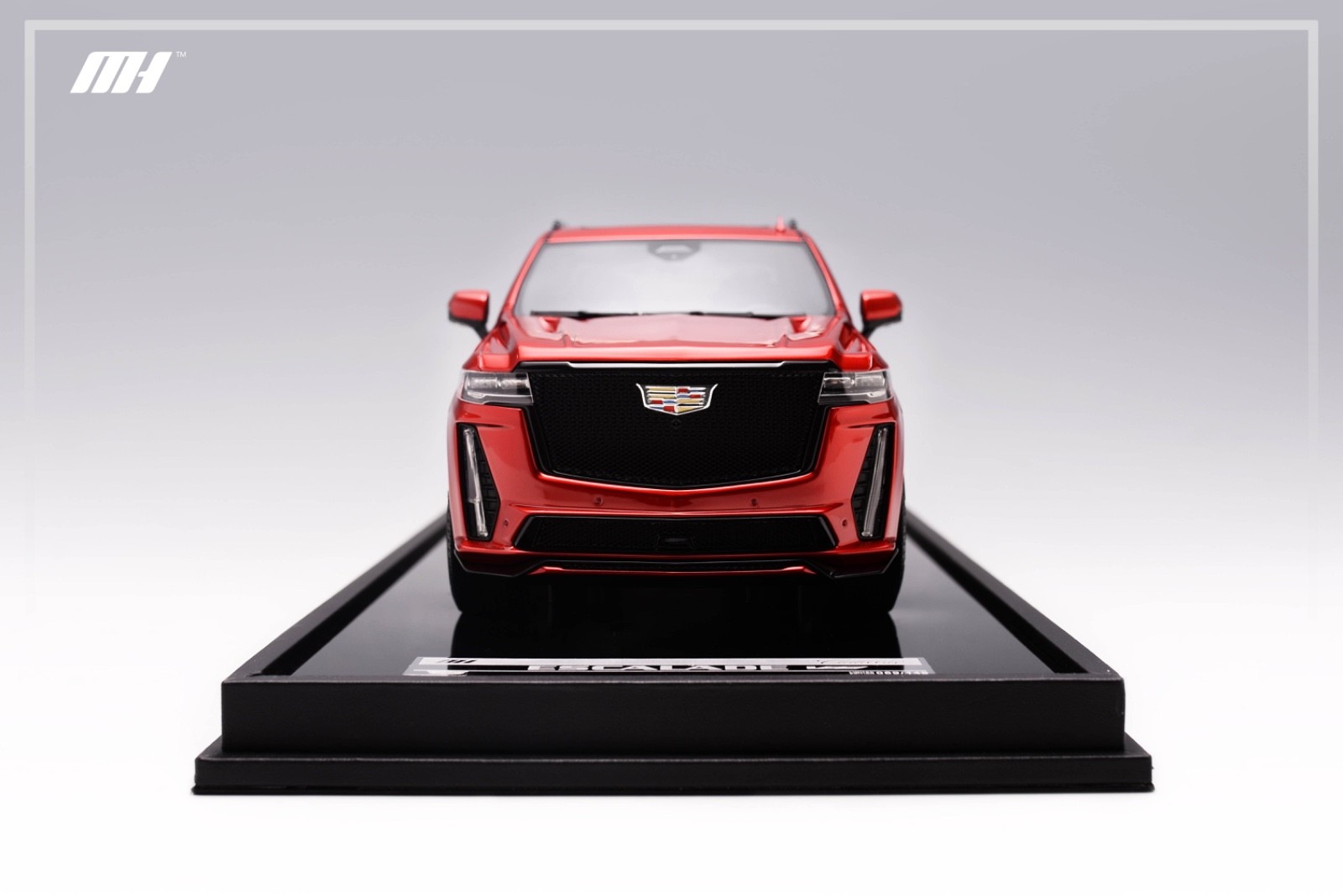 1/18 Motorhelix Cadillac Escalade V from 2022 in in red on Carbon Base