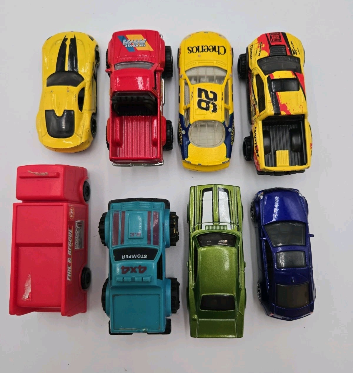 Mixed Lot of 8 Toy Cars Trucks Hot Wheels Stomper Cheerios NASCAR Fire Rescue