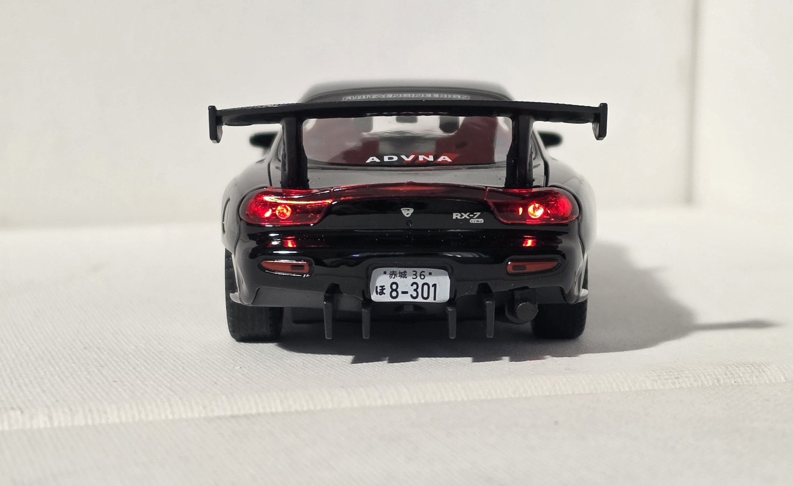 Mazda RX-7 Black Diecast Car 1:32 w/ Rear Wing Light-Up Highly Collectible