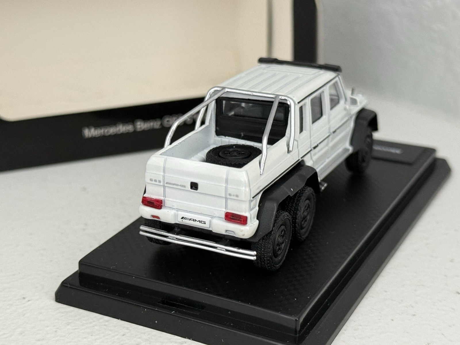 China 1:64 unbranded diecast Mercedes Benz G63 AMG 6×6 in white; premium model