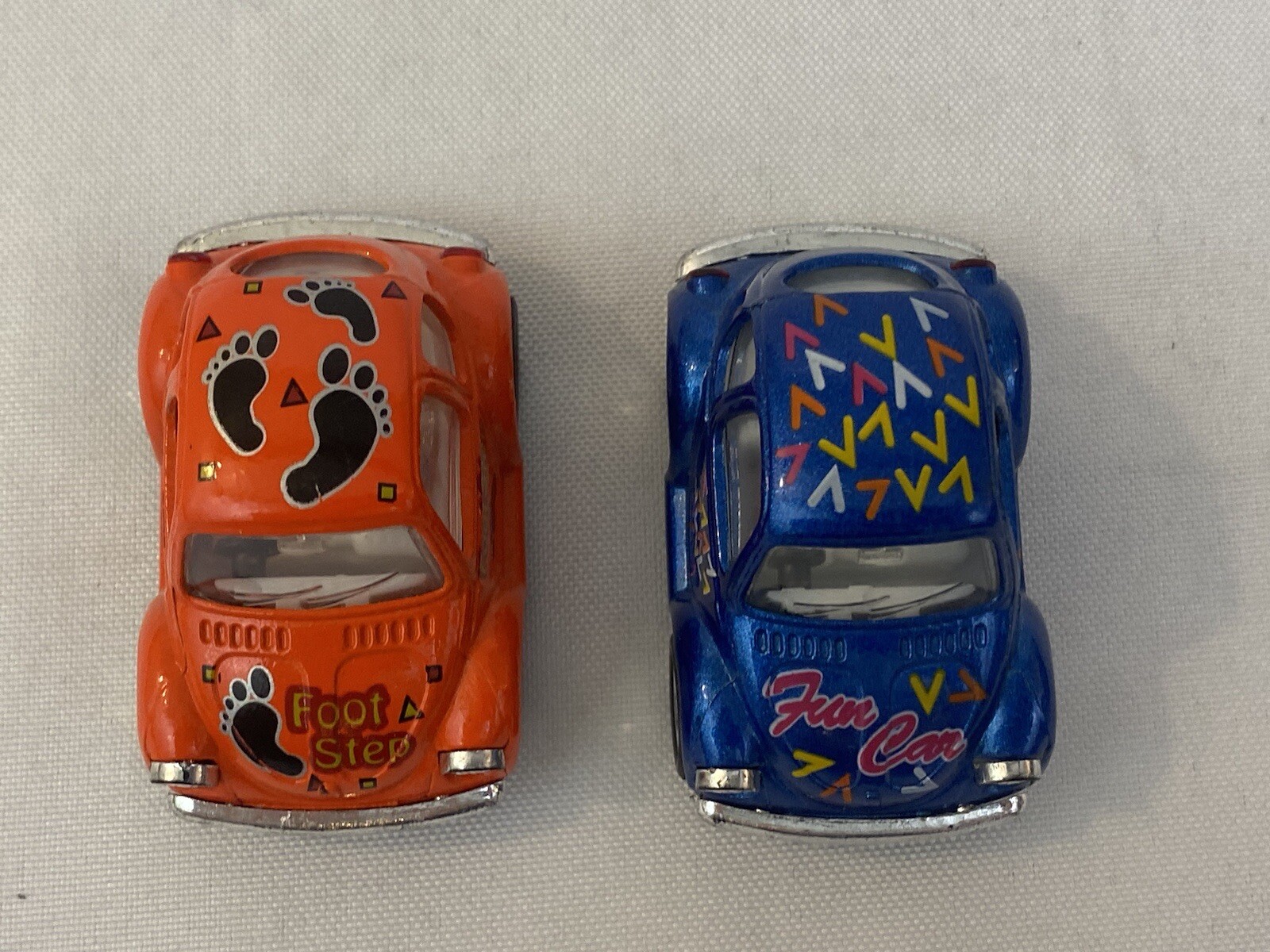 Pair Of Kintoy Pullback Volkswagen Beetles Blue Orange Foot Step Fun Car