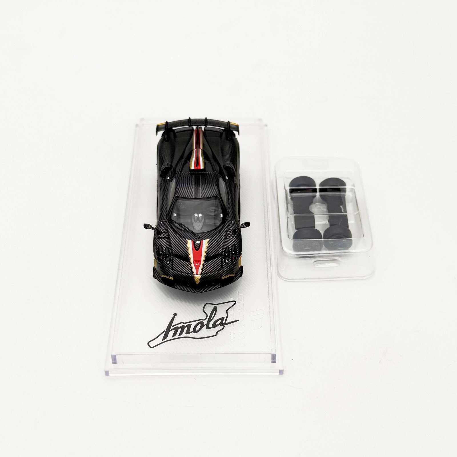CM Model 1:64 Pagani Imola Full Drycarbo Black with Extra wheels