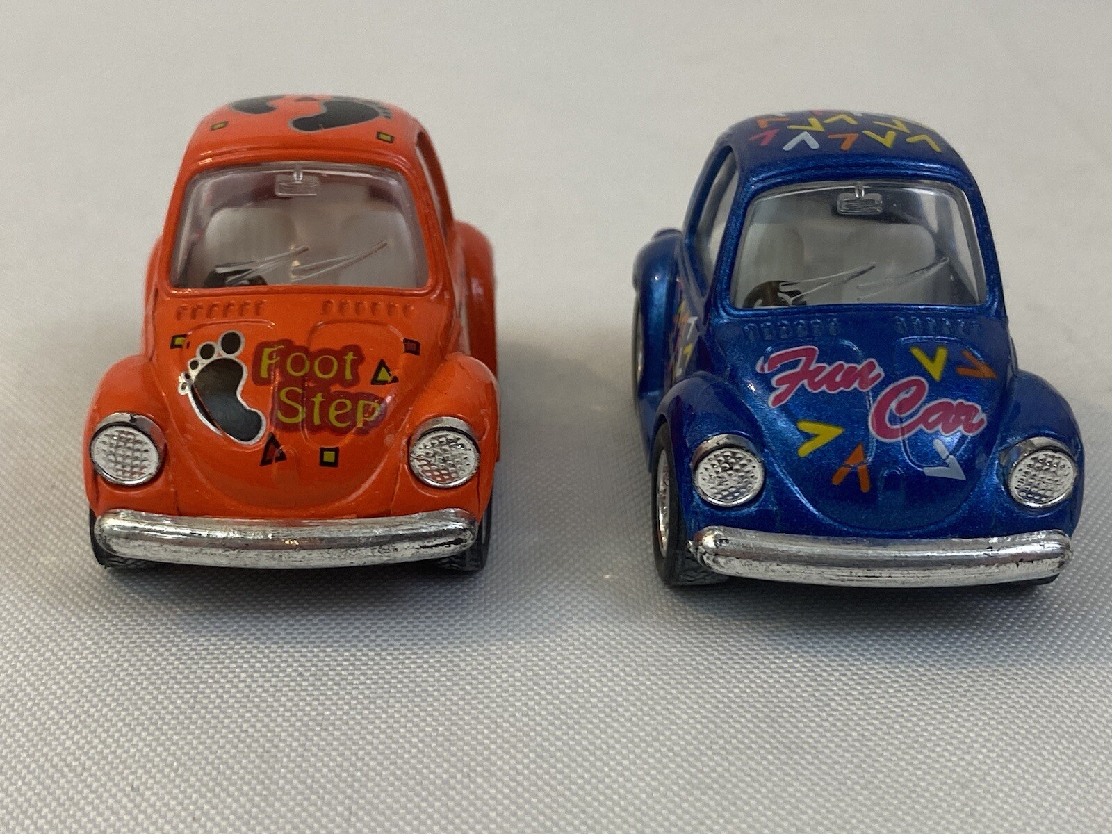 Pair Of Kintoy Pullback Volkswagen Beetles Blue Orange Foot Step Fun Car