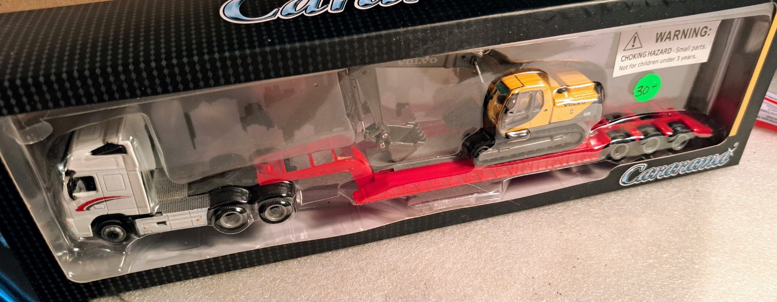 HO – Cararama 185-002 Volvo FH12 w/ Lowboy Trailer & Volvo EC210 Excavator – NIP