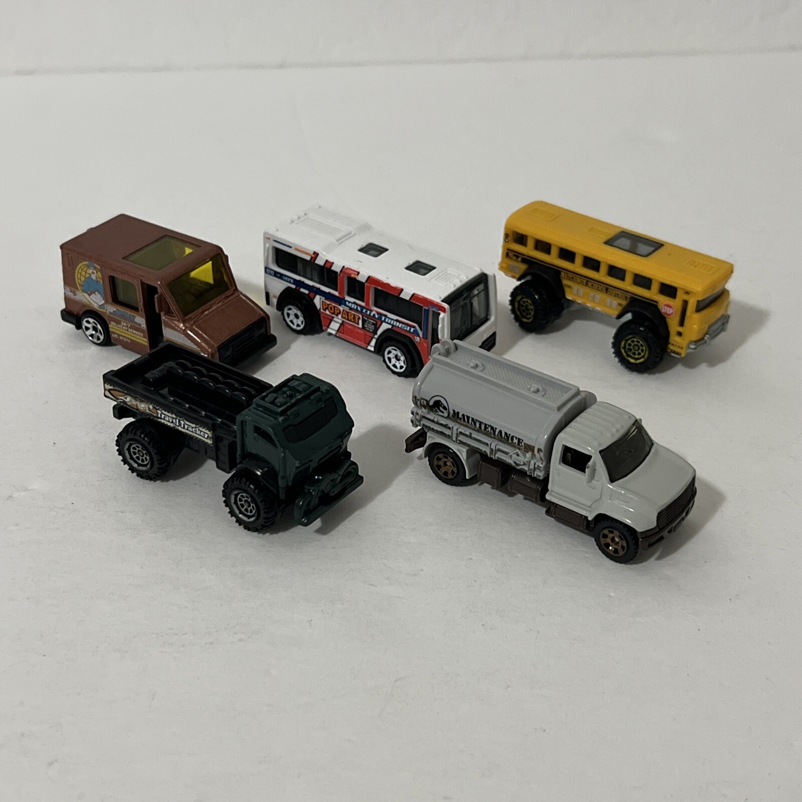 Matchbox Cars Lot Of 5 Trucks 1:64 – Travel Tracker, Pop Art, School Bus & More