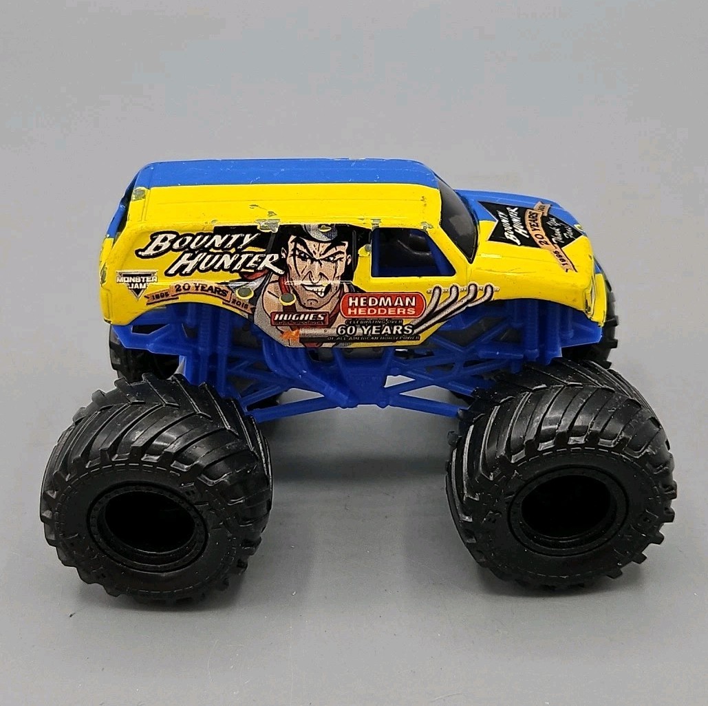 bounty hunter monster jam 1:64 diecast 20 years blue and yellow