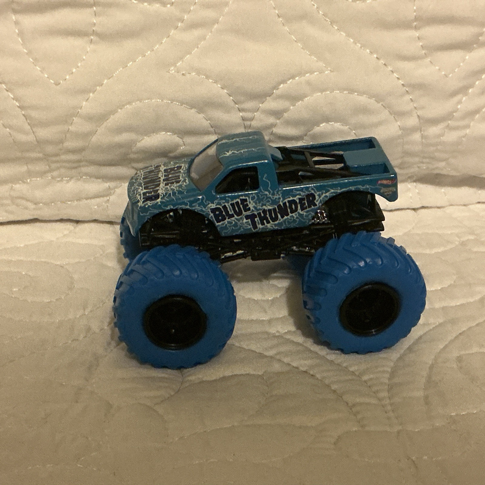 Blue Thunder Monster Jam Truck With Blue Tires And Black Rims – 1:64 Scale