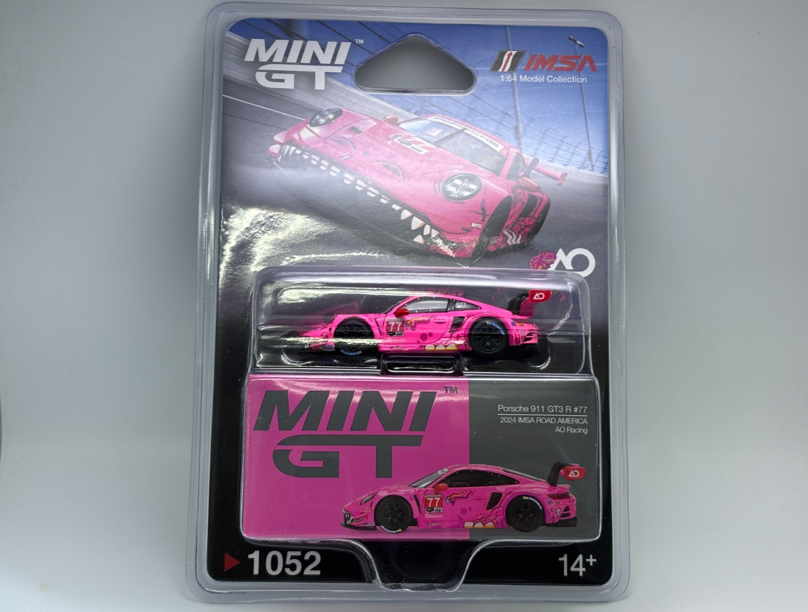 Mini GT 1/64 Porsche 911 GT3 R #77 IMSA Road America Roxy AO Racing #1052 Card