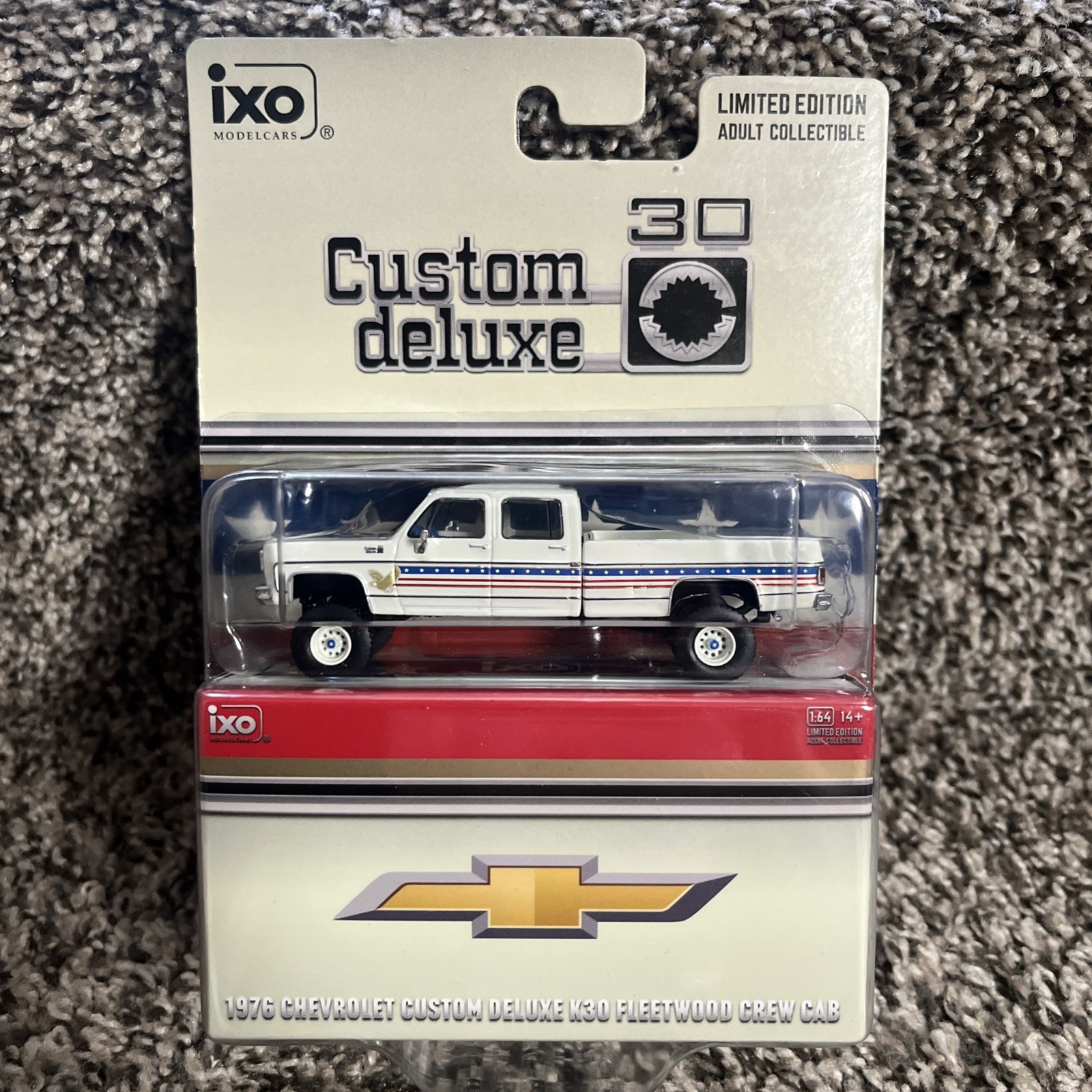1:64 IXO 1976 Chevrolet Custom Deluxe K30 Fleetside Crew Cab- July 4th Exclusive