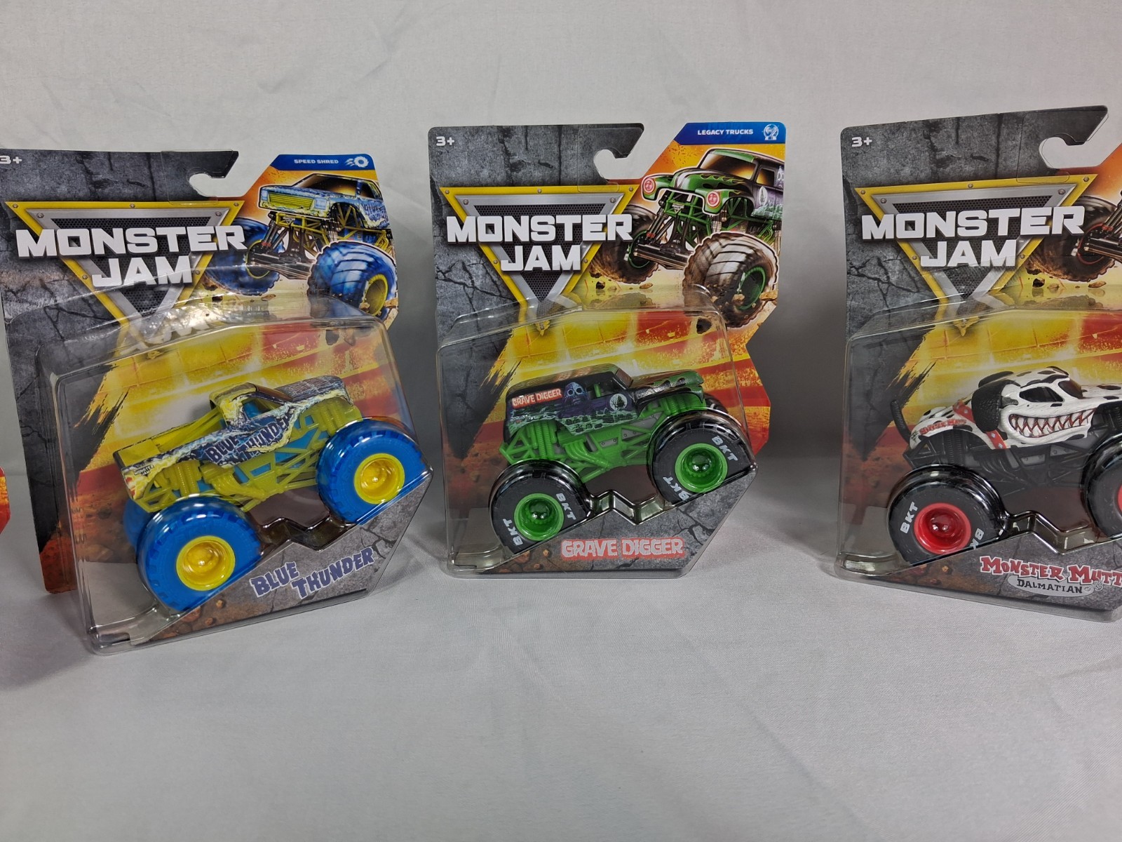 Lot of 5 Monster Jam 1:64 Diecast Trucks Blue Thunder Grave Digger Monster Mutt