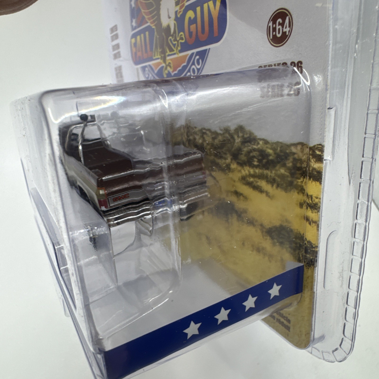 Greenlight Fall Guy Stuntman Assoc 1982 GMC K-2500 Sierra Grande 1/64