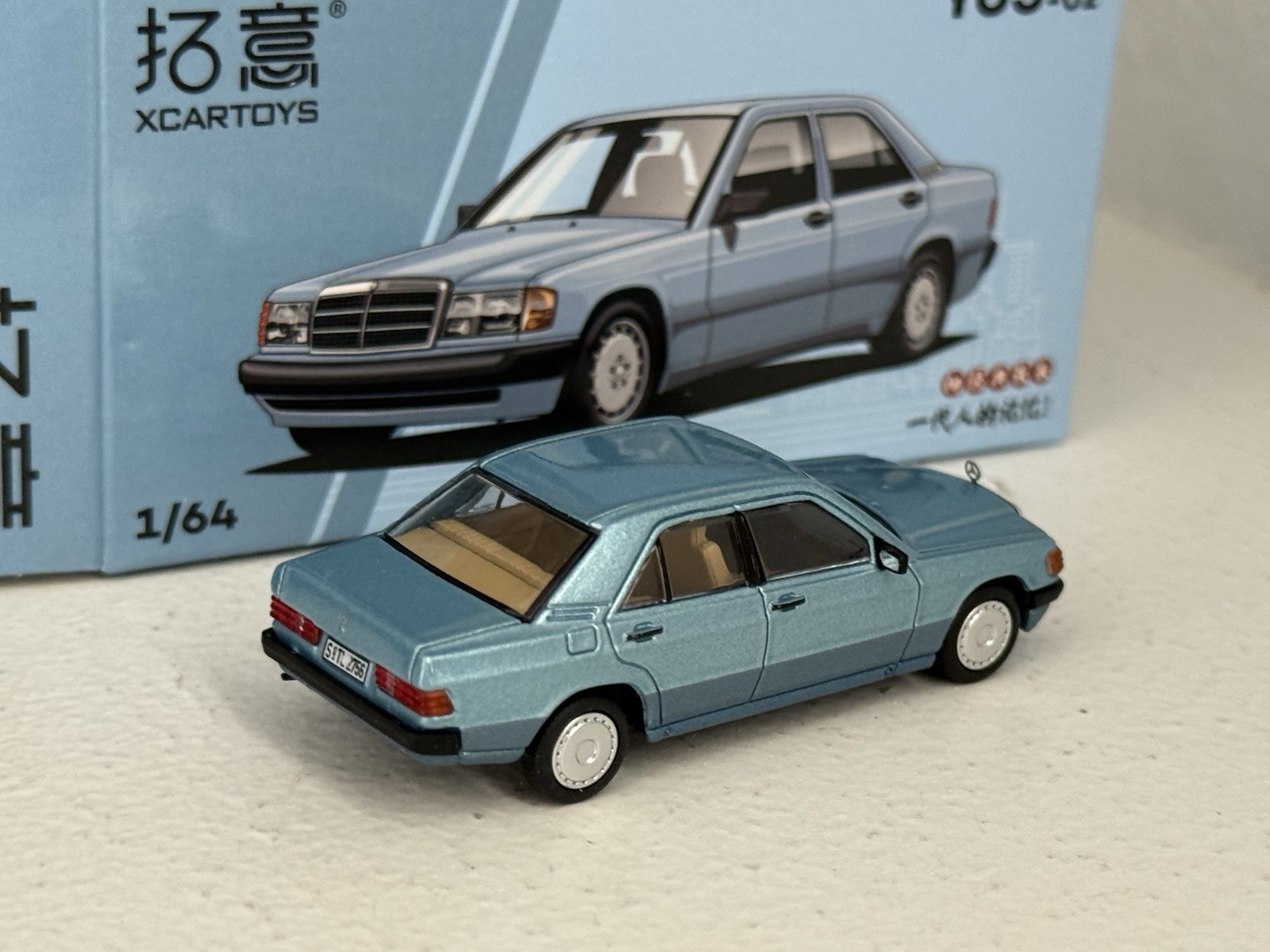 Xcartoys 1:64 diecast Y65-02 Mercedes Benz 190E in light blue 2-tone; Boxed