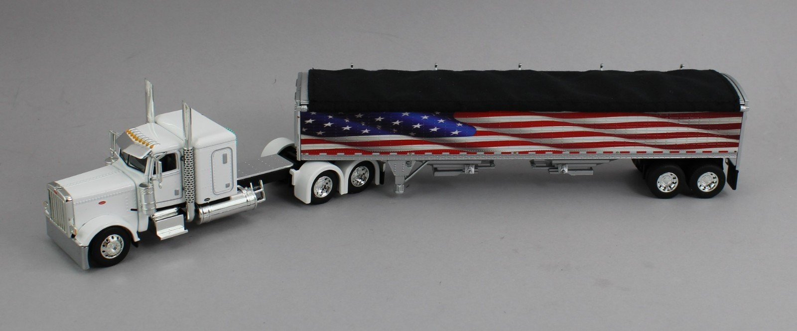 DCP 1:64 *WHITE AMERICA 250* Peterbilt 389 48″ Flattop w/Wilson Grain Trailer