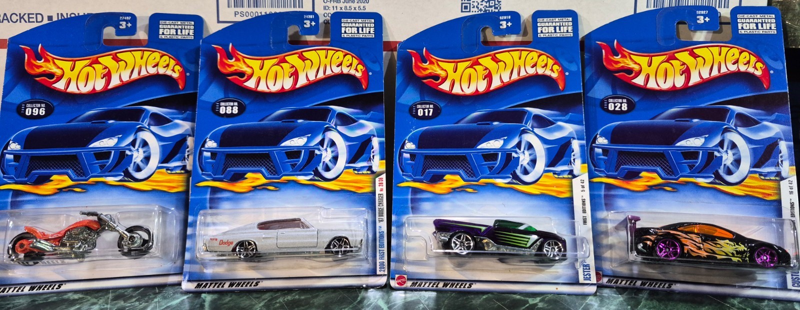4 Hot Wheels Black Lane, 67 Dodge Charger, Jester and Custom Cougar