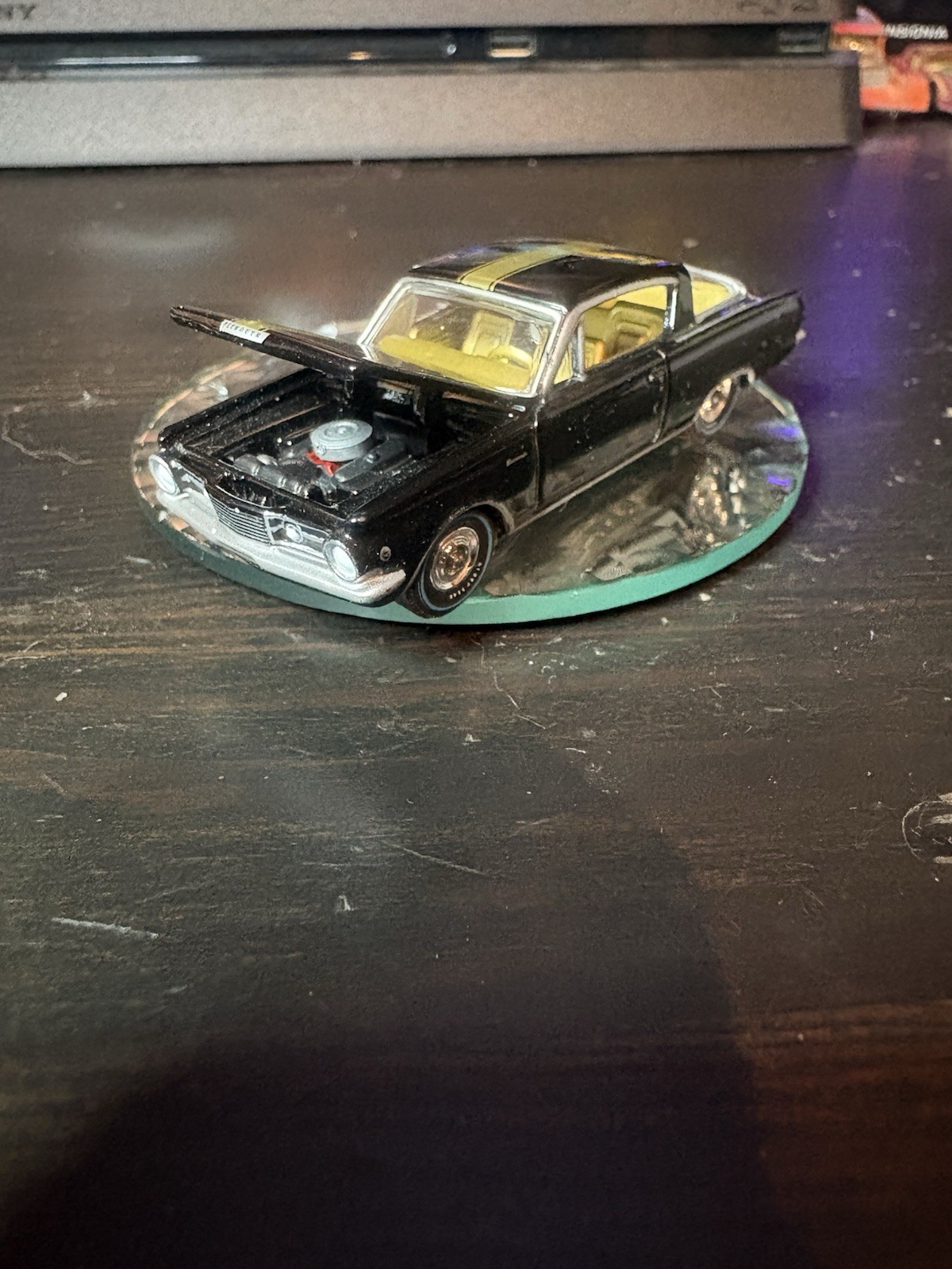 Auto World 1/64 Die-cast Model 1965 Plymouth Barracuda Formula S In Black