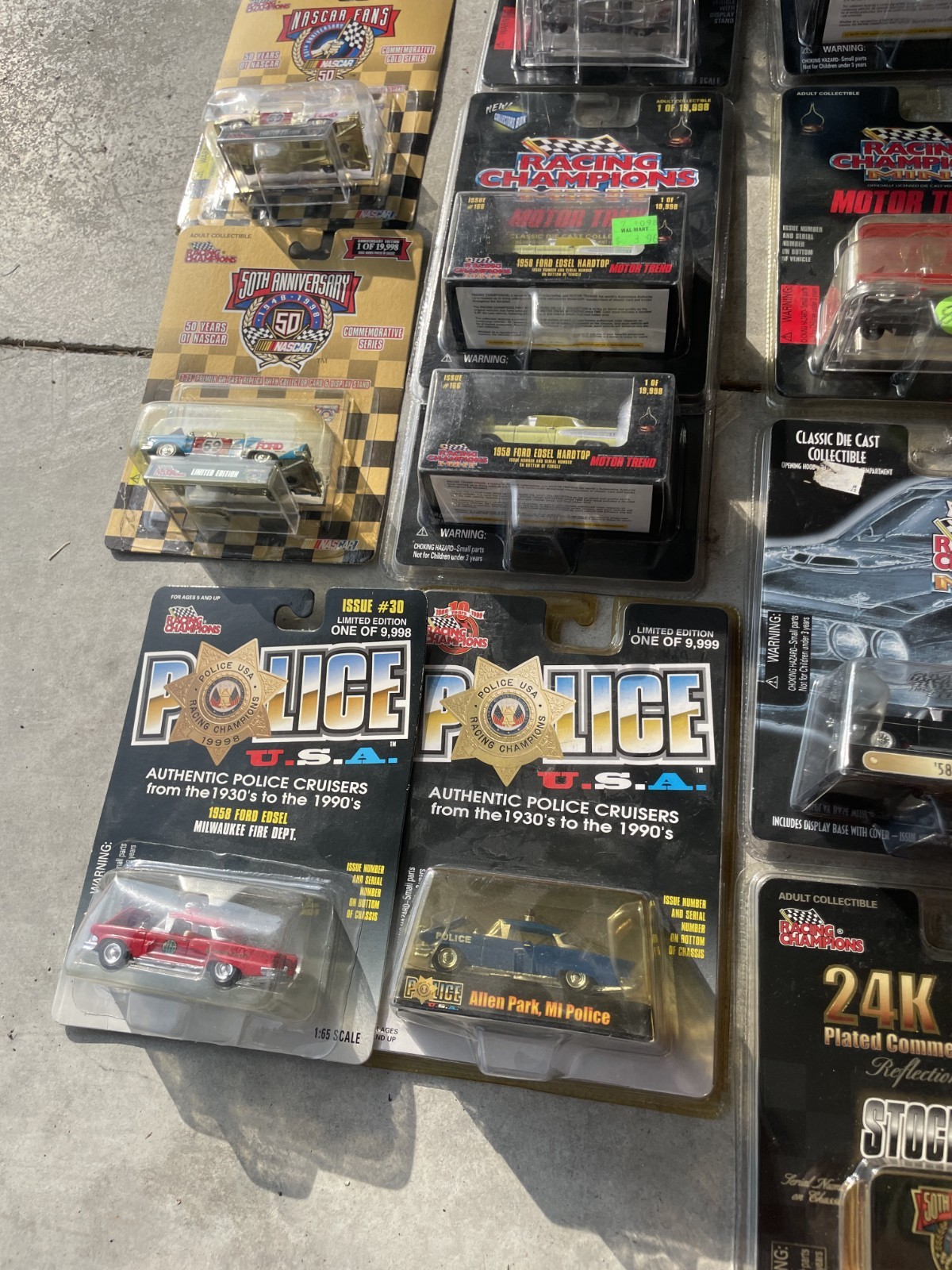 Various brands of 1:64 cars – new in packaging