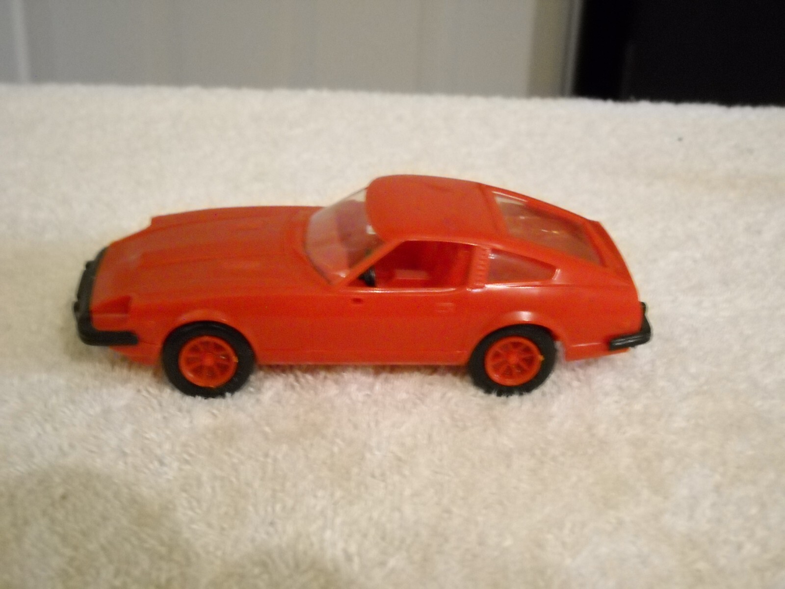 MMI Plastic 1980 Red Car, Nissan, Good Condition, Please see the photos
