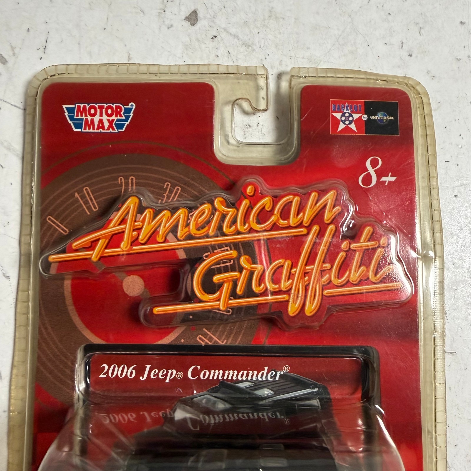 Motor Max American Graffiti Edition 2006 Jeep Commander 1:64 Scale Vehicle NEW