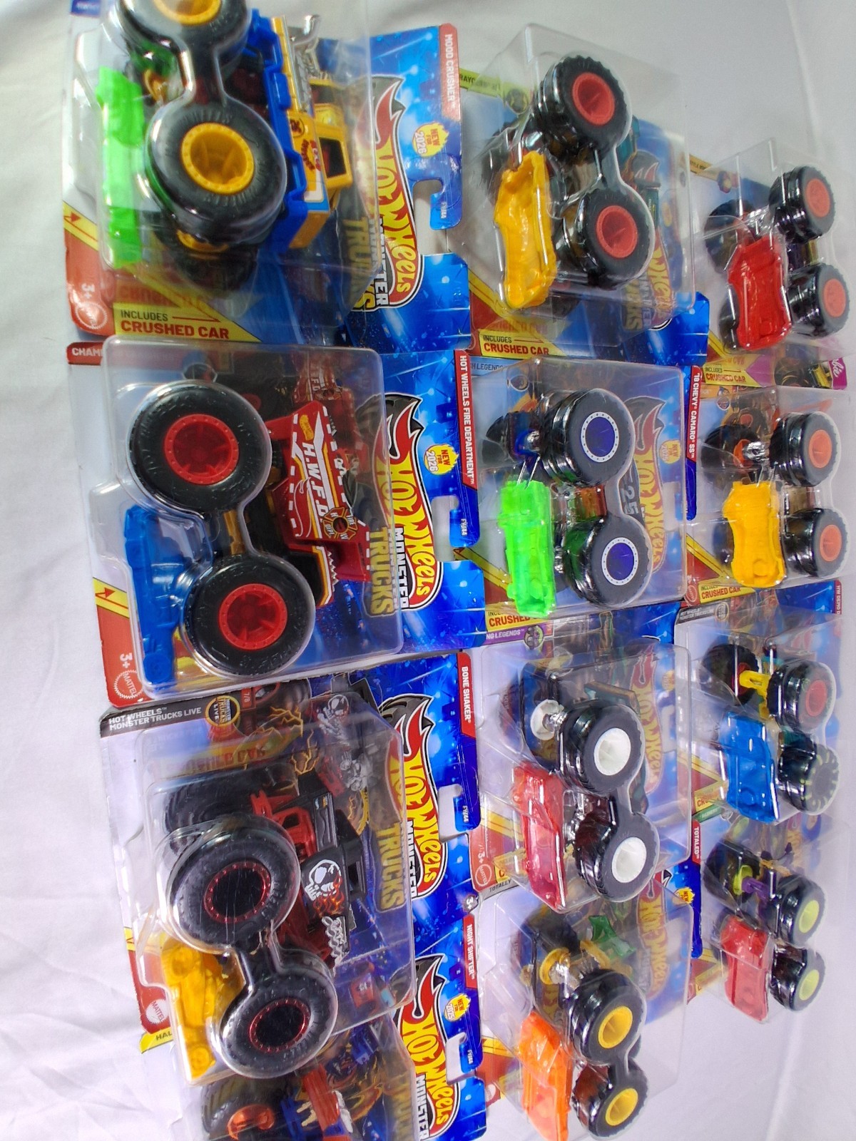 Lot of 12 Hot Wheels Monster Trucks Sealed Bone Shaker Fire Dept Camaro SS…