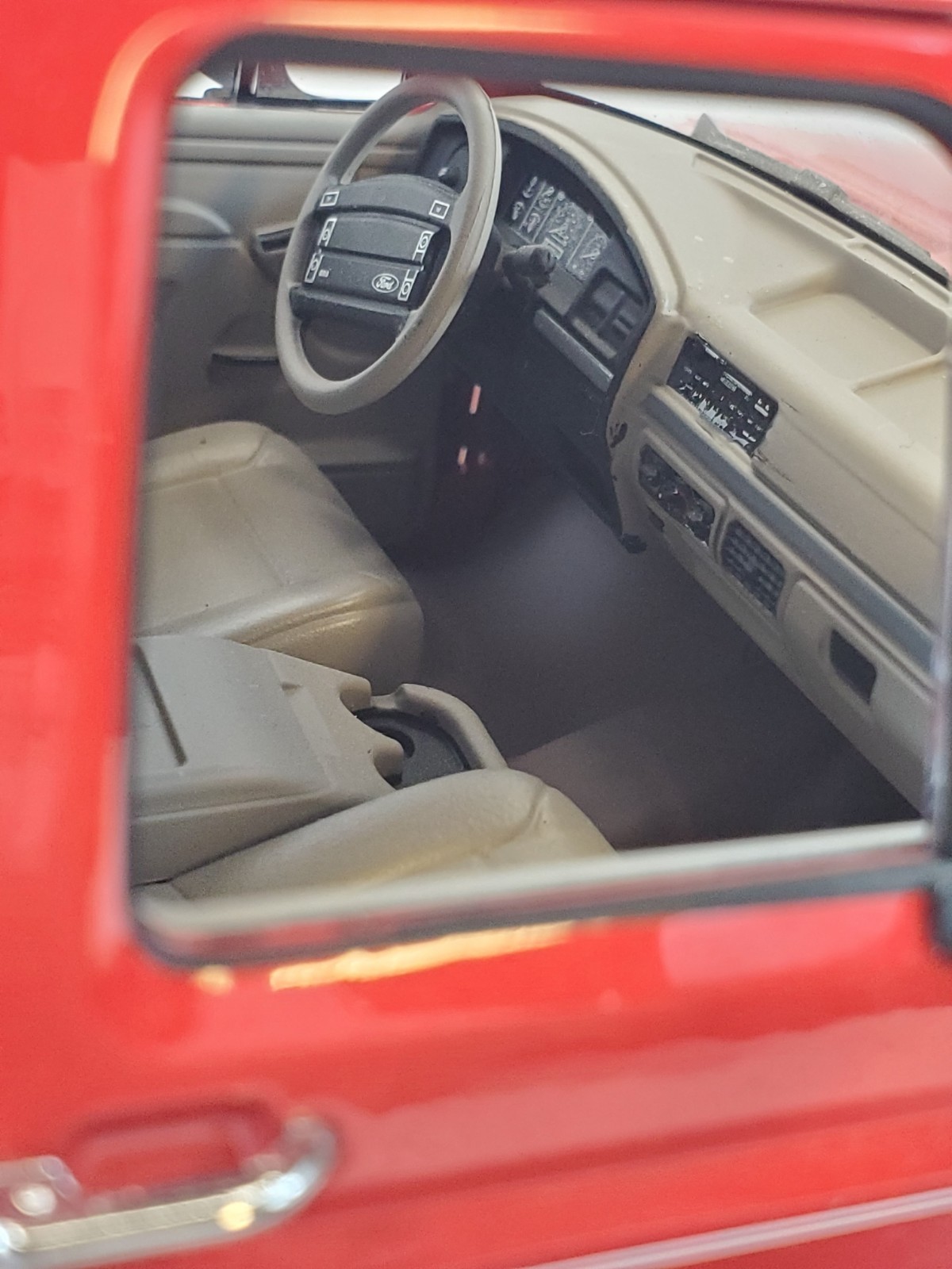 Greenlight 1994 Ford Bronco Eddie Bauer Edition Electric Red & Bronze 1/18