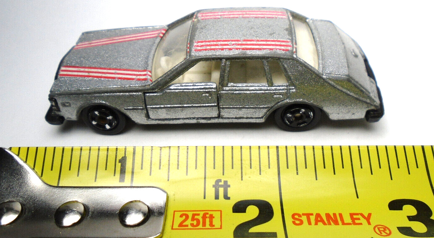 VINTAGE MADE IN HONG KONG CADILLAC SEVILLE SILVER 3″ DIECAST CAR OPENING DOORS