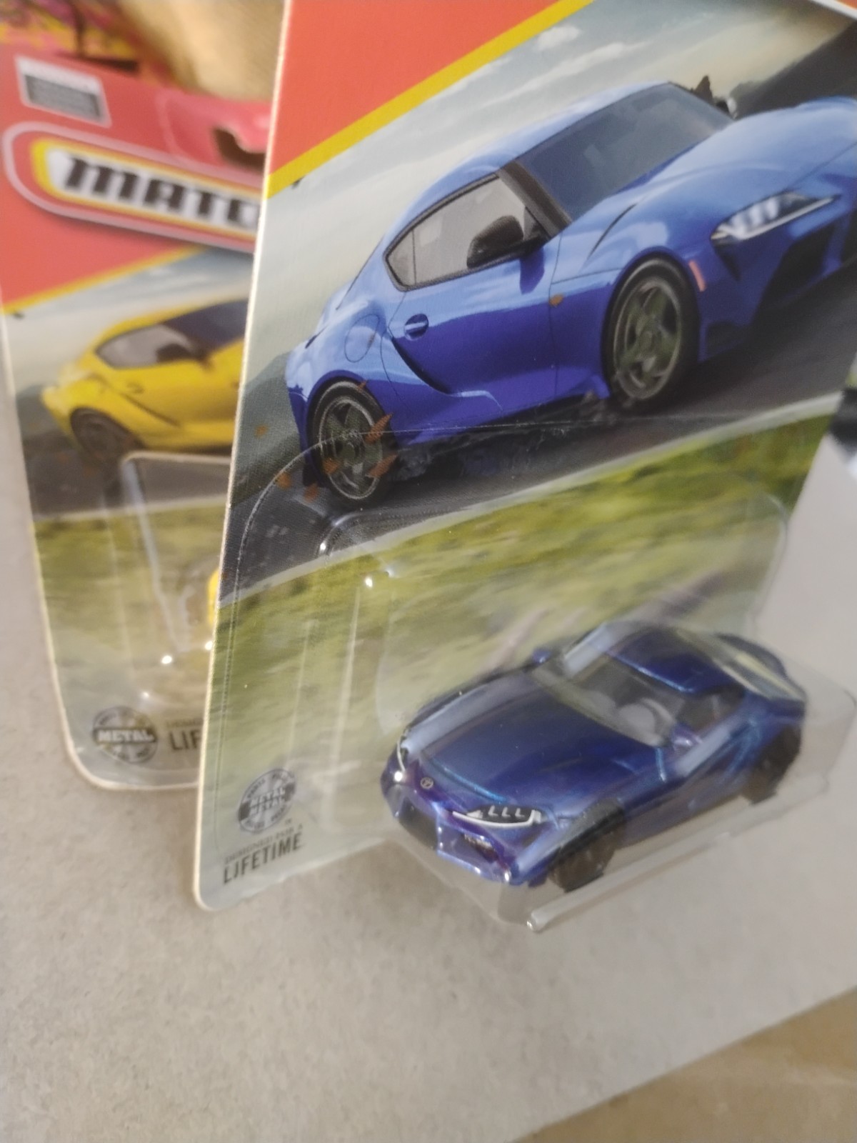 Blue And Yellow 2023 Toyota Gr Supra Matchbox 164 Scale