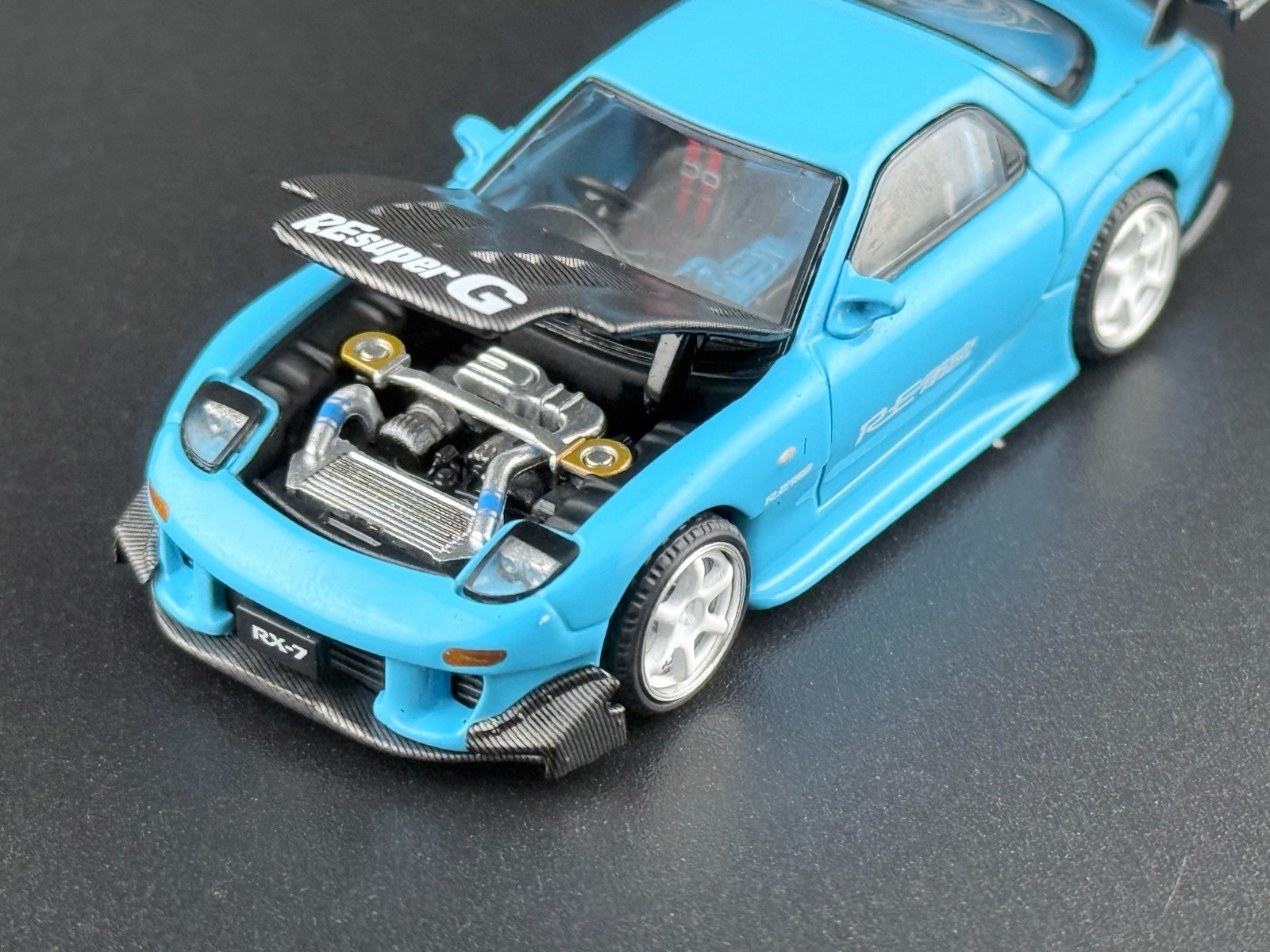 Pop Race Mazda RX7 FD3S RE-Amemiya Light Blue TAS 2026 640472 1/64