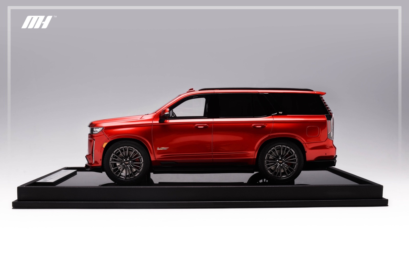 1/18 Motorhelix Cadillac Escalade V from 2022 in in red on Carbon Base