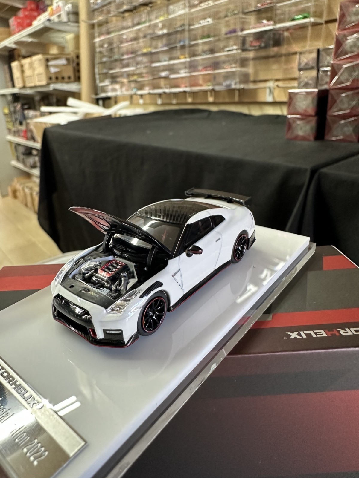 NISSAN SKYLINE GT-R R35 NISMO CARBON WHITE HOOD OPEN 1/64 CAR BY MOTORHELIX MH