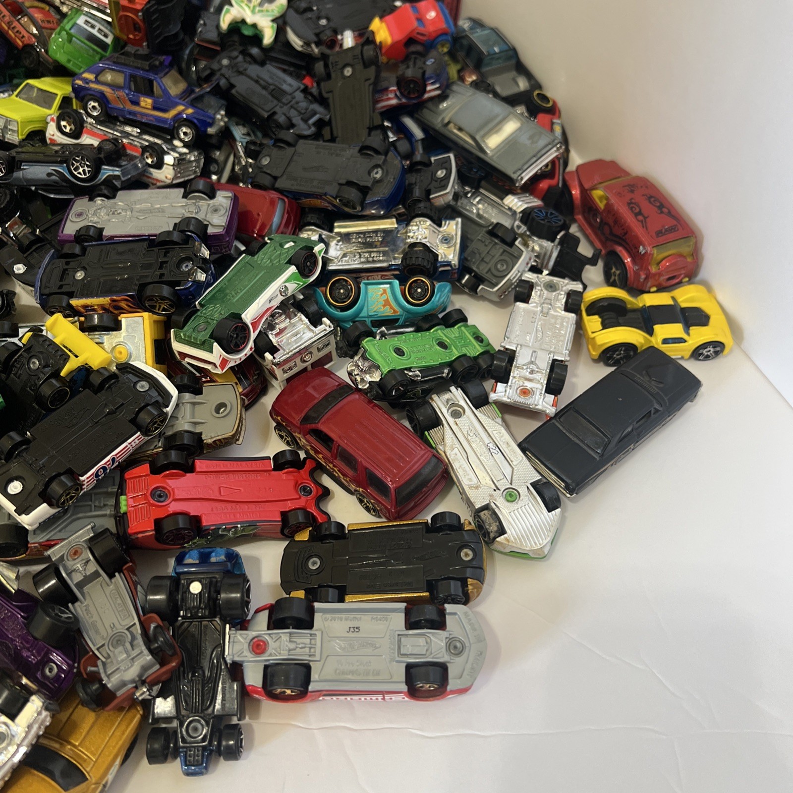 30 LBS Pounds of pure hotwheels. There are many different years and castings.
