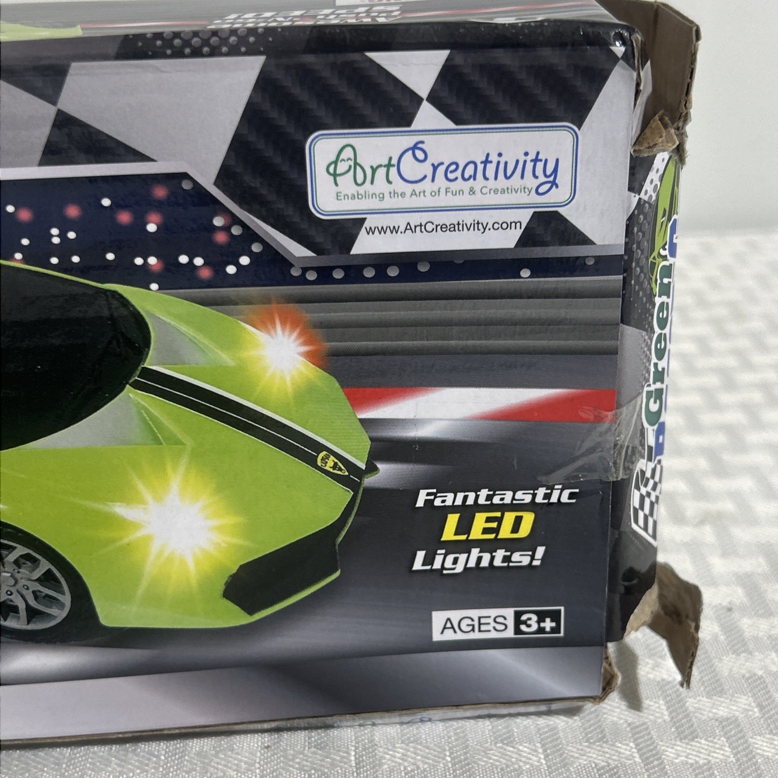 ART CREATIVITY GREEN RACER CAR PUSH N GO SPEED NEW IN DAMAGED BOX
