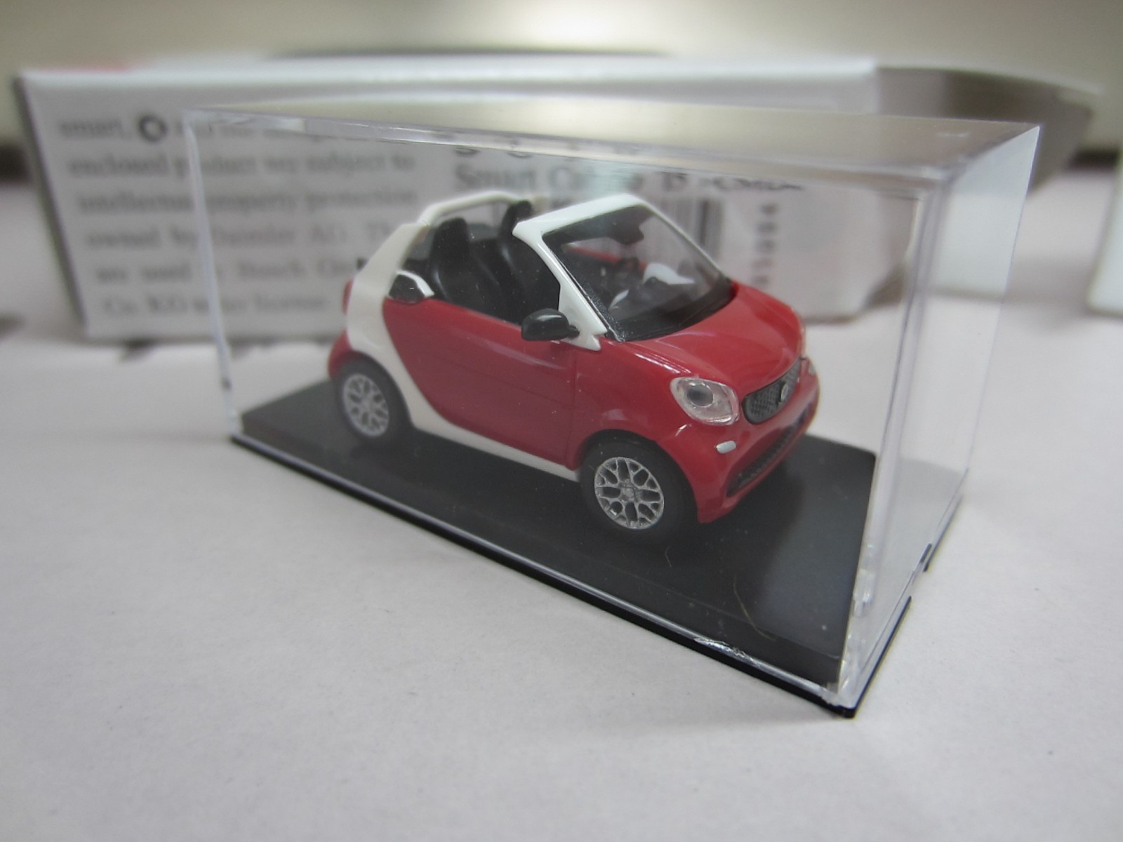 BUSCH 50778 SMART FORTWO CABRIO 2015 in RED – model is PLASTIC – HO / 1:87 scale