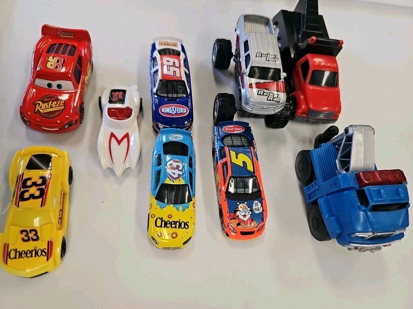 Lot Of 9 Assorted Die-Cast And Plastic Toy Cars Assorted manufacturing.