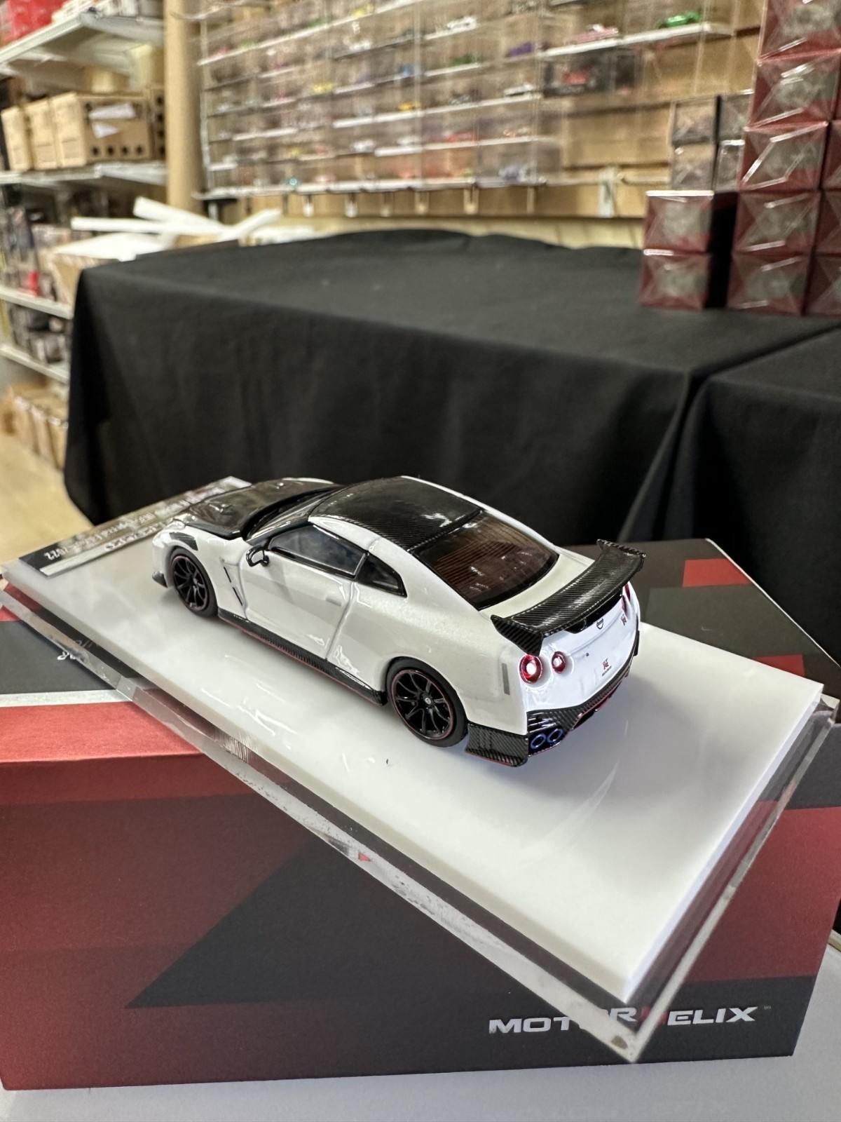 NISSAN SKYLINE GT-R R35 NISMO CARBON WHITE HOOD OPEN 1/64 CAR BY MOTORHELIX MH