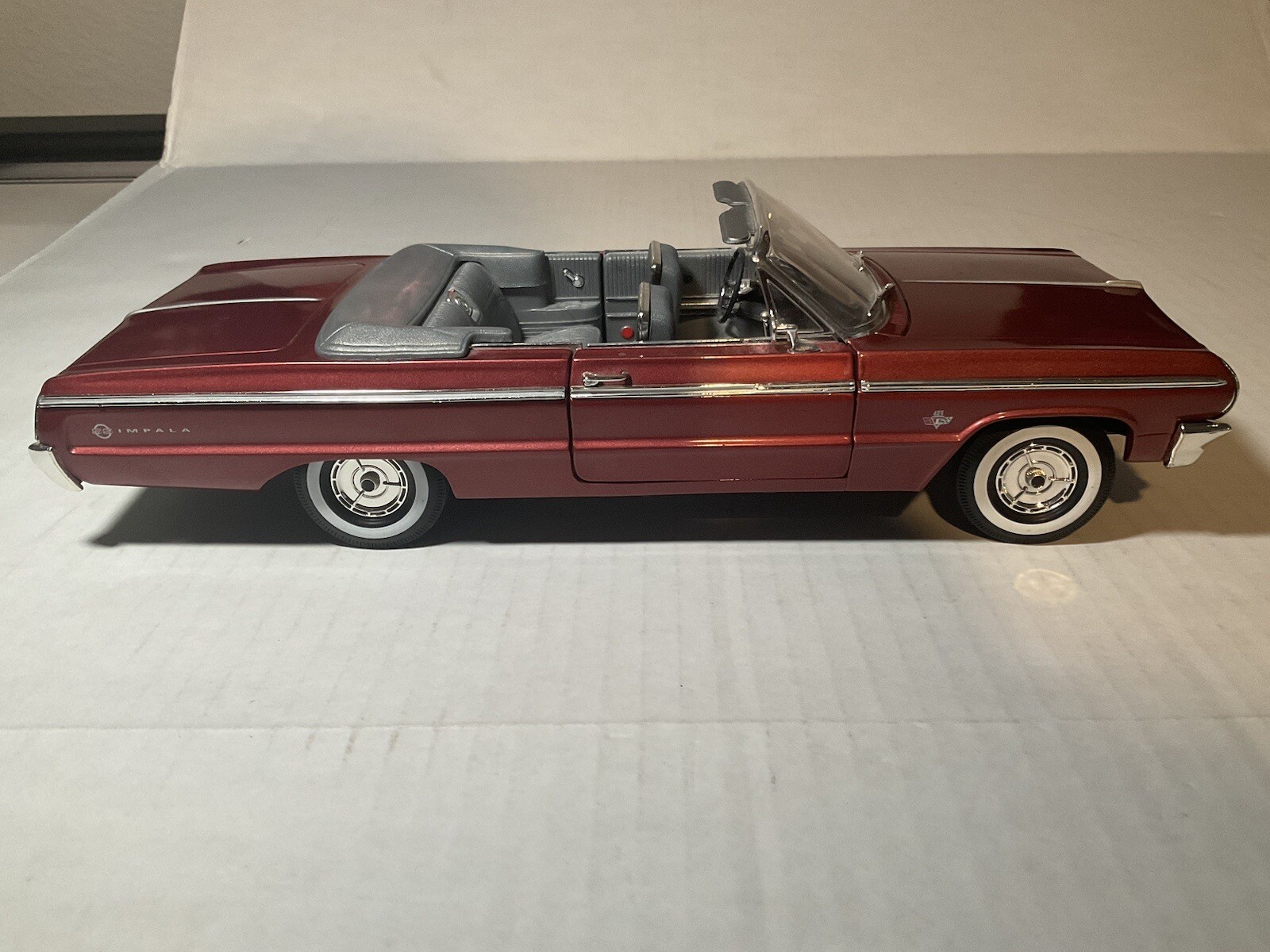 ERTl 1/18 1964 Impala Convertible SS. Plum Red, No BOX, Good Condition
