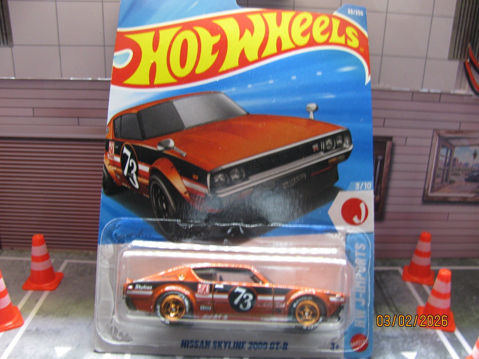 2026 Hot Wheels Burnt Orange Nissan Skyline 2000 GT-R, w/Real Riders Wheel Swap