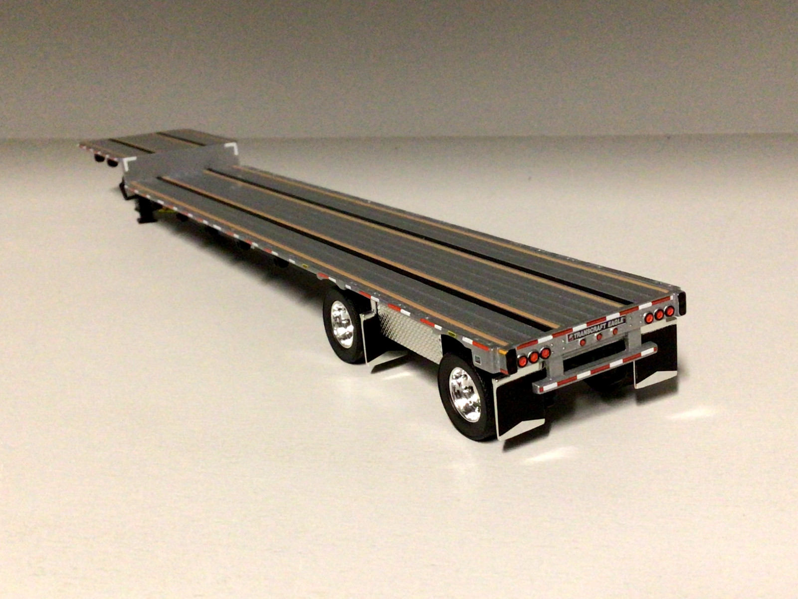 DCP 1/64 SILVER & BLACK TRANSCRAFT STEPDECK W/ BOXES