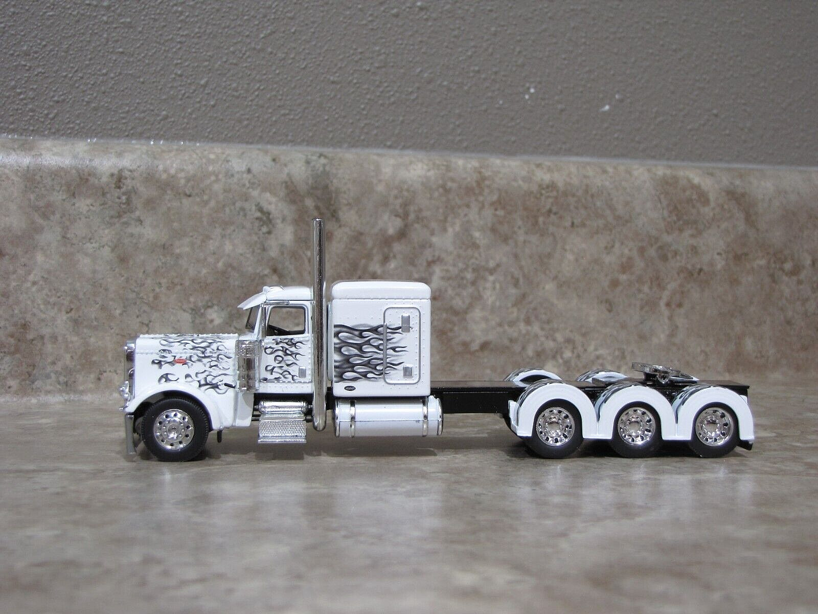 DCP 1/64 White Black Flames Tri-Axle 389 Peterbilt Semi Truck Farm Toy